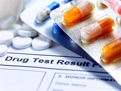 stock photo syringe with glass vials and medications pills drug test report 228978439 1920w