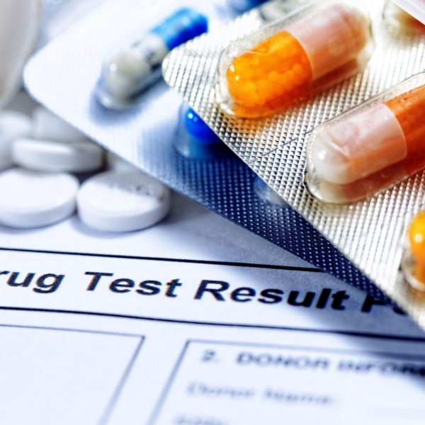 stock photo syringe with glass vials and medications pills drug test report 228978439 1920w